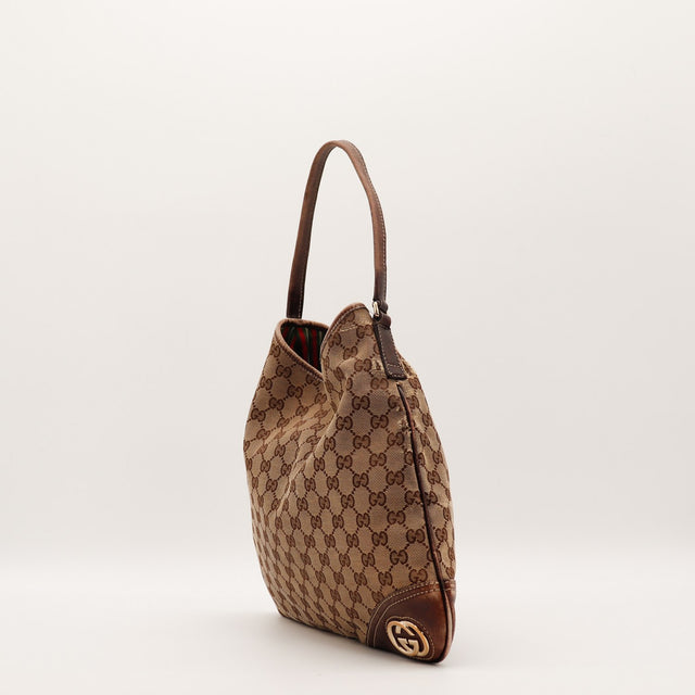 Sac Gucci Hobo toile monogrammée vue de trois quarts occasion authentique — AMANA Vintage
