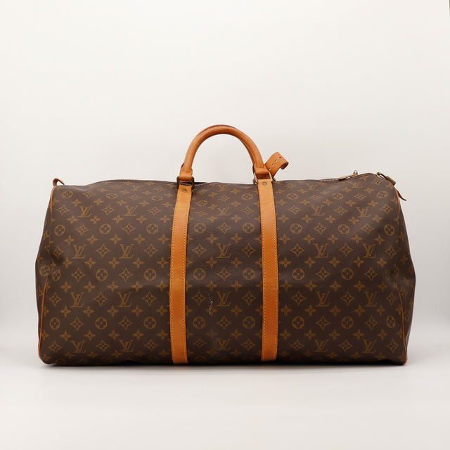 Sac de voyage Louis Vuitton Keepall 60 Bandouliere toile Monogram vue de face occasion authentique — AMANA Vintage