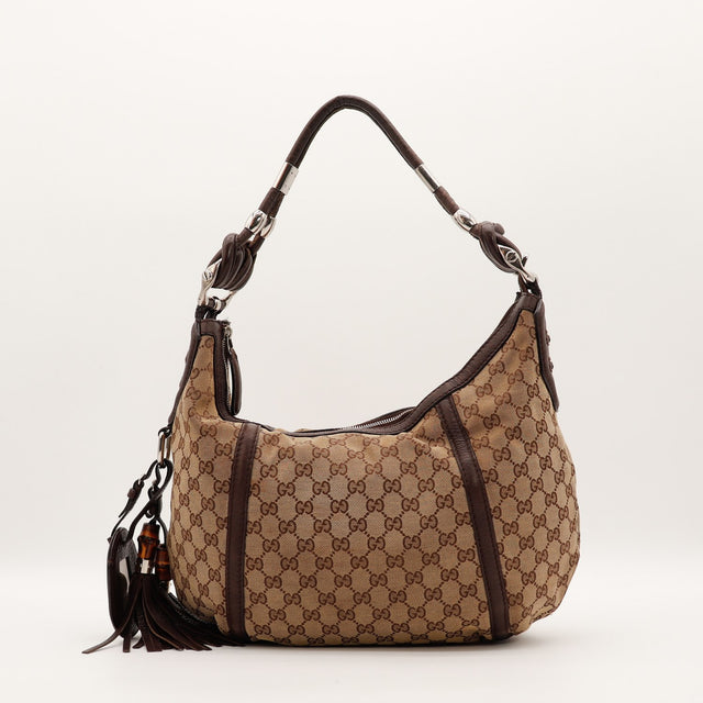 Sac Gucci Hobo beige et marron vue de face avec pompon bambou — AMANA Vintage