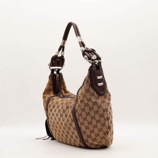 Sac Gucci Hobo vue de profil anse cuir nouée argentée — AMANA Vintage