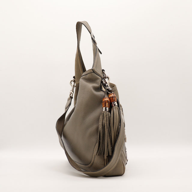 Sac Gucci Indy Hobo vue de côté pompons bambou occasion authentique — AMANA Vintage