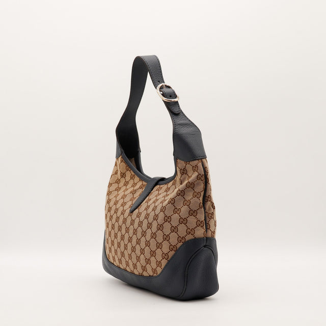Sac Gucci Jackie vue de profil anse cuir noir réglable occasion authentique — AMANA Vintage