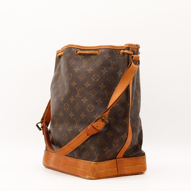 Vue de côté Louis Vuitton Noé Toile Monogramme occasion authentique — AMANA Vintage