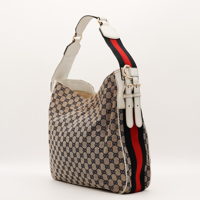 Sac Gucci Hobo Web bande Web rouge et bleue vue de trois quarts occasion authentique — AMANA Vintage