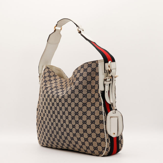Sac Gucci Hobo Web boucles cuir blanc vue de profil occasion authentique — AMANA Vintage