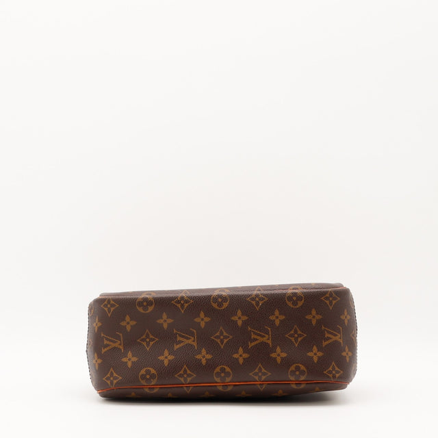 Détail de la patine du cuir vachette Louis Vuitton Trouville occasion authentique — AMANA Vintage
