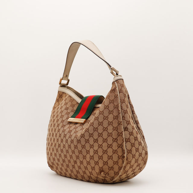 Sac Gucci Hobo Web vue de trois quarts cuir ivoire occasion authentique — AMANA Vintage