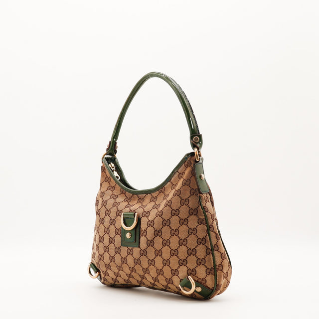 Sac Gucci Hobo vue de trois quarts toile monogrammée occasion authentique — AMANA Vintage