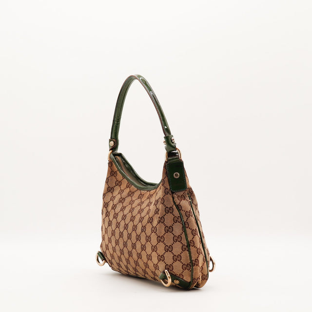 Sac Gucci Hobo vue de profil anse cuir verni vert occasion authentique — AMANA Vintage