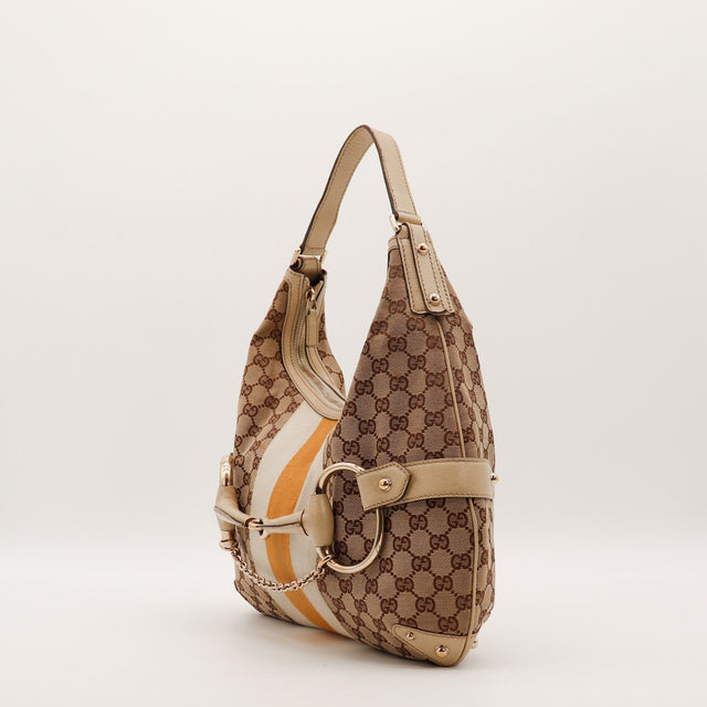 Sac Gucci Hobo Horsebit vue de trois quarts garnitures cuir ivoire occasion authentique — AMANA Vintage