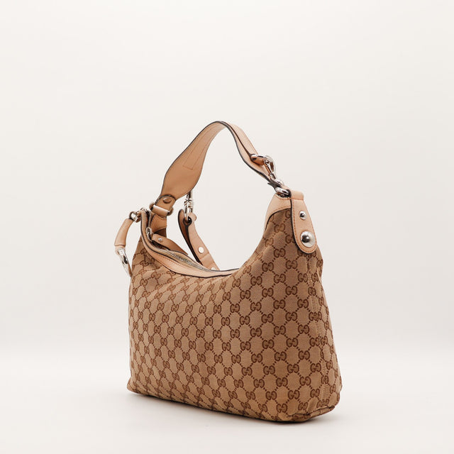 Sac Gucci Hobo toile monogrammée vue de trois quarts occasion authentique — AMANA Vintage
