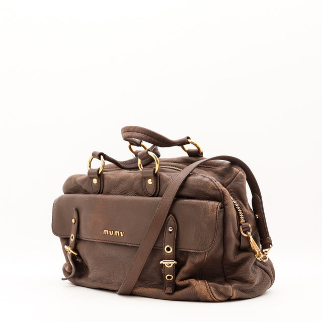 Vue de dos Miu Miu Bowler cuir de chèvre grainé marron bronze occasion authentique — AMANA Vintage