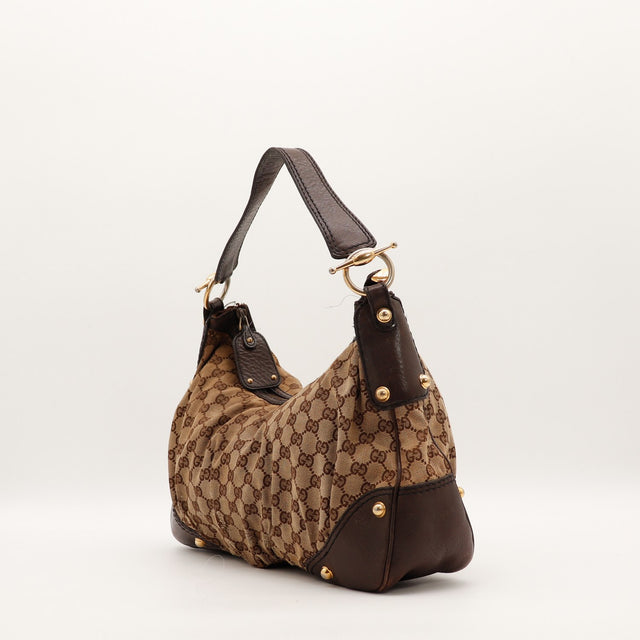 Sac Gucci Hobo toile monogrammée vue de trois quarts occasion authentique — AMANA Vintage