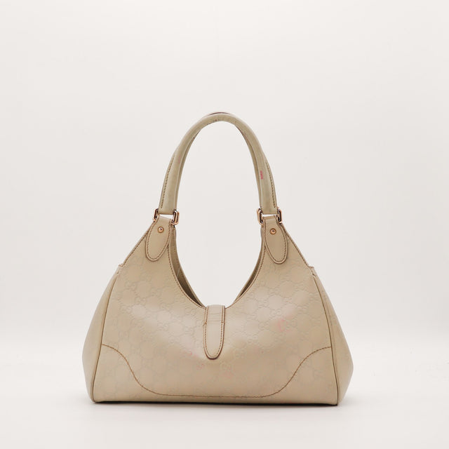 Sac Gucci New Jackie cuir Guccissima taupe vue de dos occasion — AMANA Vintage