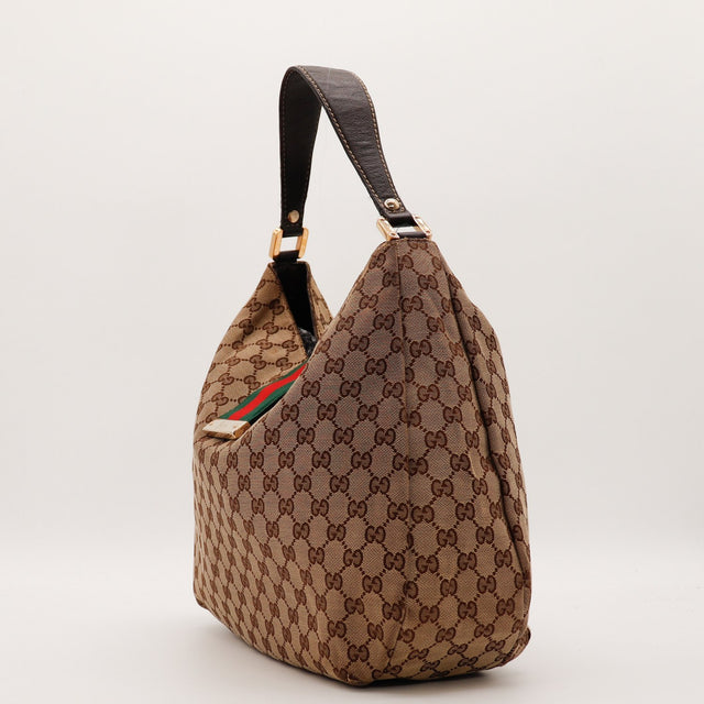 Gucci Hobo Web toile monogrammée vue de profil angle gauche occasion — AMANA Vintage