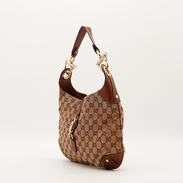 Sac Gucci New Jackie vue de trois quarts cuir cognac occasion authentique — AMANA Vintage