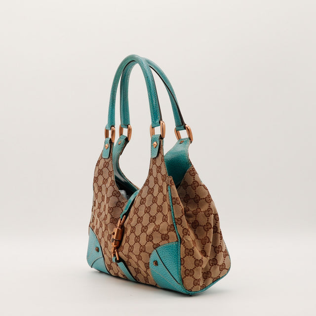 Sac Gucci New Jackie vue de trois quarts cuir turquoise occasion authentique — AMANA Vintage