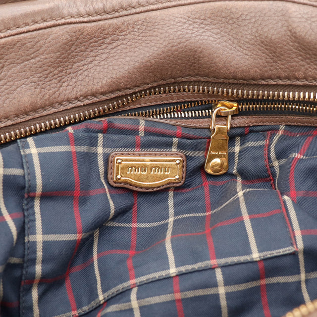 Vue d'ensemble Miu Miu Bowler cuir de chèvre grainé marron bronze occasion authentique — AMANA Vintage