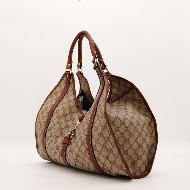 Vue de trois quarts Tote Horsebit Gucci toile monogrammée beige marron — AMANA Vintage