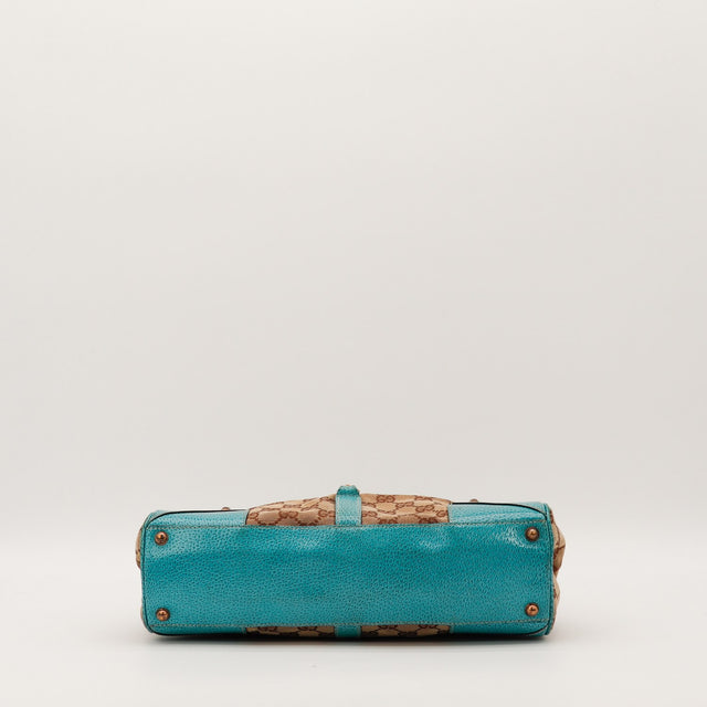 Fond en cuir turquoise du sac Gucci New Jackie occasion authentique — AMANA Vintage