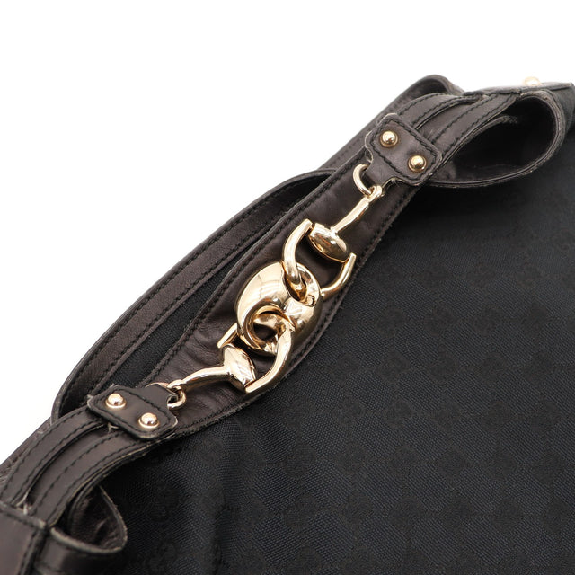 Vue du fond Gucci Hobo Horsebit toile monogrammée noire occasion authentique — AMANA Vintage