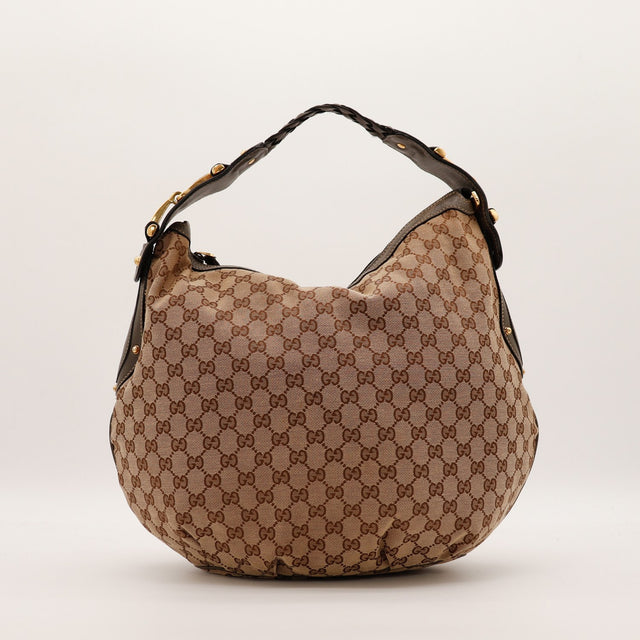 Vue de trois-quarts droite Gucci Hobo Horsebit toile monogrammée occasion — AMANA Vintage