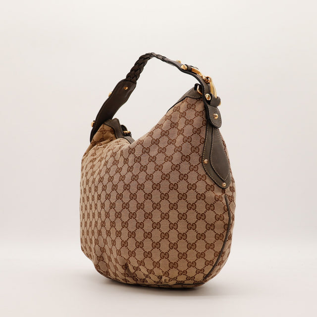 Vue de trois-quarts arrière Gucci Hobo Horsebit cuir marron foncé — AMANA Vintage