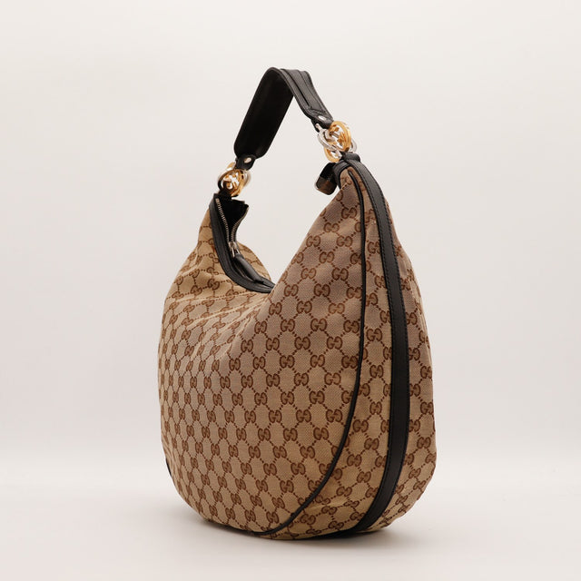 Vue de profil Hobo Gucci Interlocking G cuir noir bande latérale — AMANA Vintage