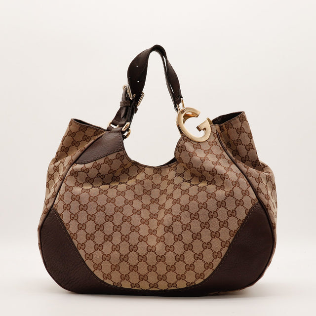 Hobo Gucci toile monogrammée beige marron fermoir doré vue de face occasion authentique — AMANA Vintage