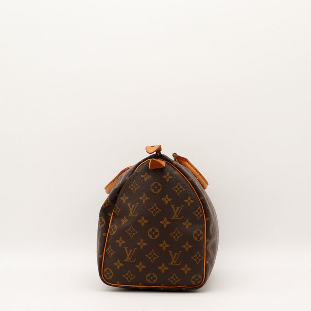 Louis Vuitton Speedy 30 vue de profil côté droit cuir vachette patine — AMANA Vintage