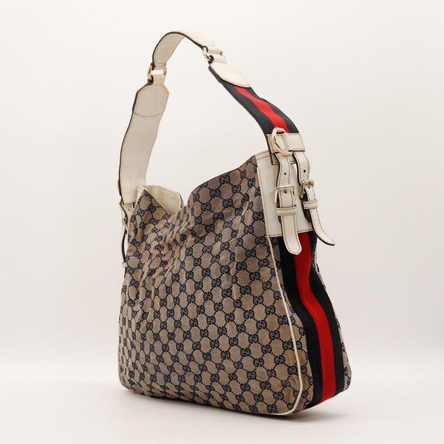 Sac Gucci Hobo Web vue trois quarts bande Web rouge et bleue occasion authentique — AMANA Vintage