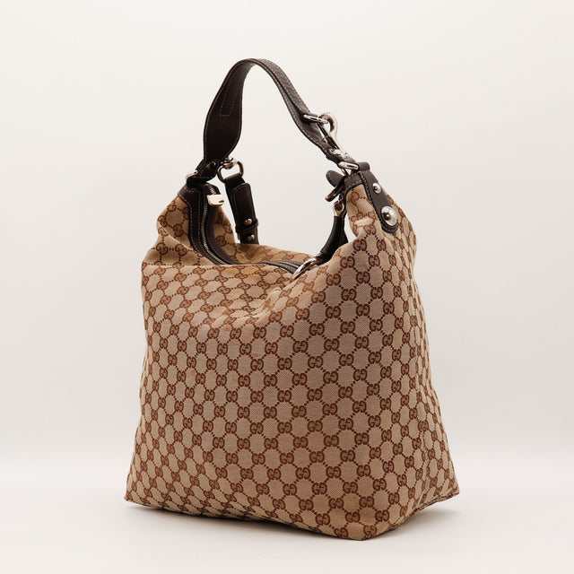 Sac Gucci Hobo toile monogrammée vue de trois quarts occasion authentique — AMANA Vintage