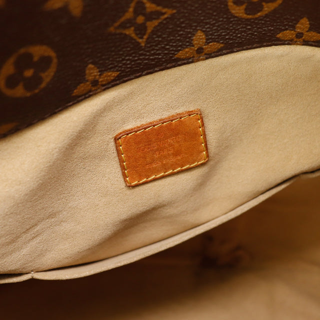 Interieur doublure beige Louis Vuitton Artsy MM etiquette cuir — AMANA Vintage