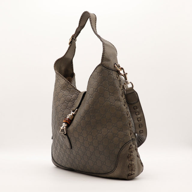 Sac Gucci New Jackie vue de profil cuir embossé occasion authentique — AMANA Vintage
