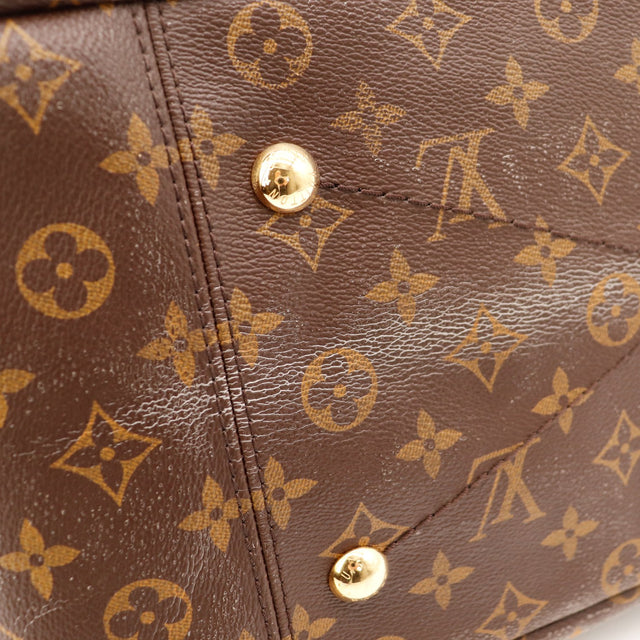 Detail coins inferieurs Louis Vuitton Artsy MM usure lisere — AMANA Vintage