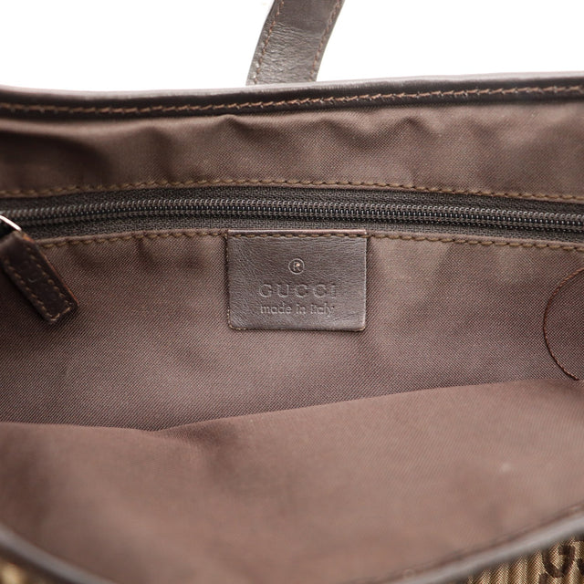 Intérieur doublure textile et plaque Gucci made in Italy — AMANA Vintage
