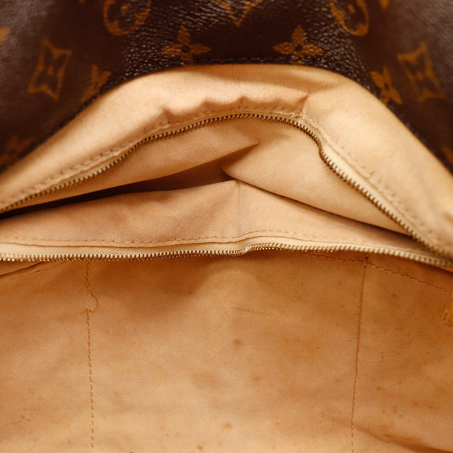 Vue interieure Louis Vuitton Artsy MM poche zippee doublure beige — AMANA Vintage