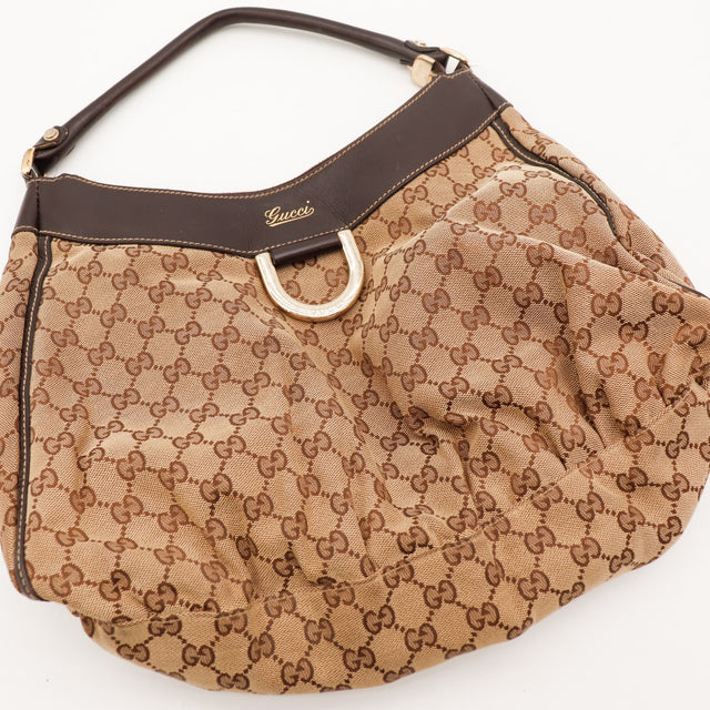 Sac Gucci Hobo vue plongeante anneau doré occasion authentique — AMANA Vintage