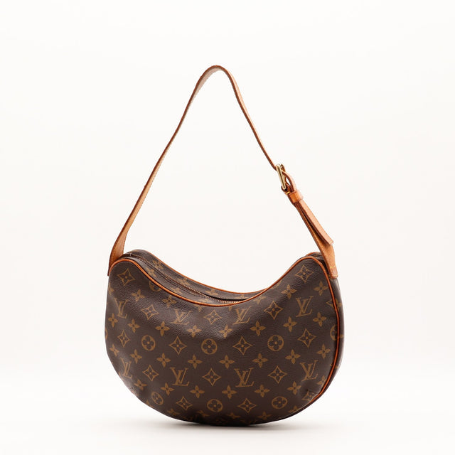 Détail de l'anse en cuir vachette Louis Vuitton Croissant MM occasion authentique — AMANA Vintage
