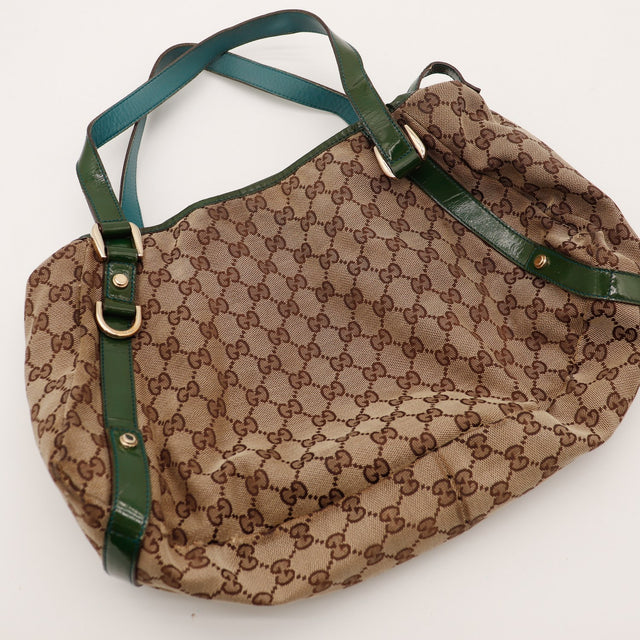 Sac Gucci Hobo posé à plat anses cuir verni vert — AMANA Vintage