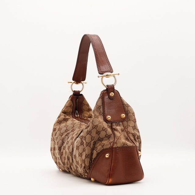 Vue de côté Gucci Hobo toile monogrammée beige et cuir marron occasion authentique — AMANA Vintage