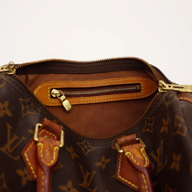 Intérieur doublure et poche zippée Louis Vuitton Speedy 25 — AMANA Vintage
