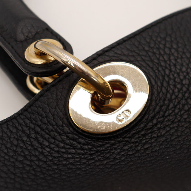 Détail anneau doré attache anse Dior Diorissimo occasion authentique — AMANA Vintage