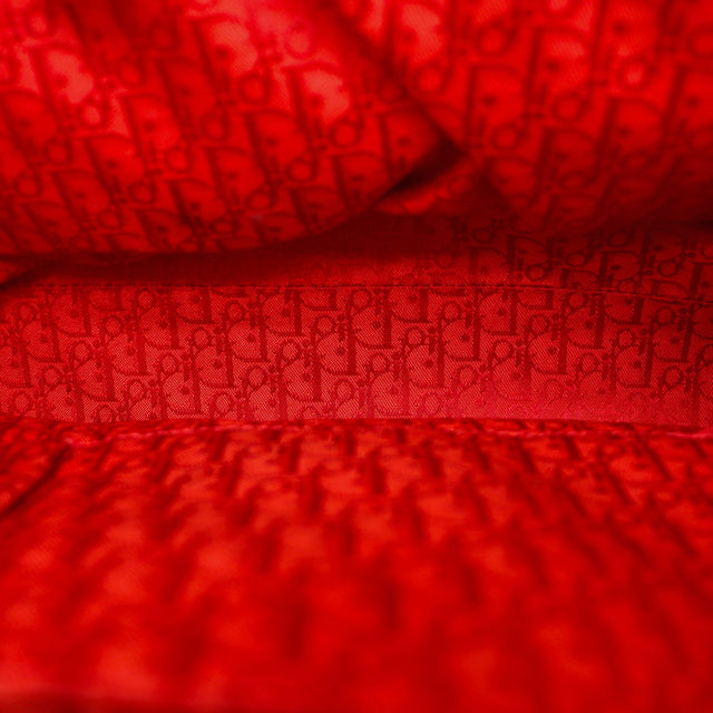 Doublure monogrammée rouge intérieur sac Dior occasion authentique — AMANA Vintage