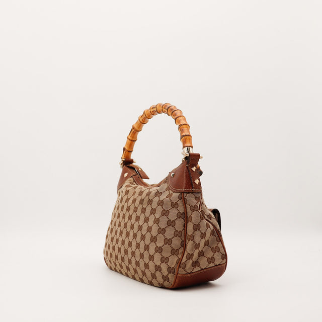 Vue de profil Gucci Hobo Bamboo cuir marron occasion authentique — AMANA Vintage