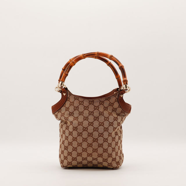 Détail des anses en bambou Gucci Bambou occasion authentique — AMANA Vintage