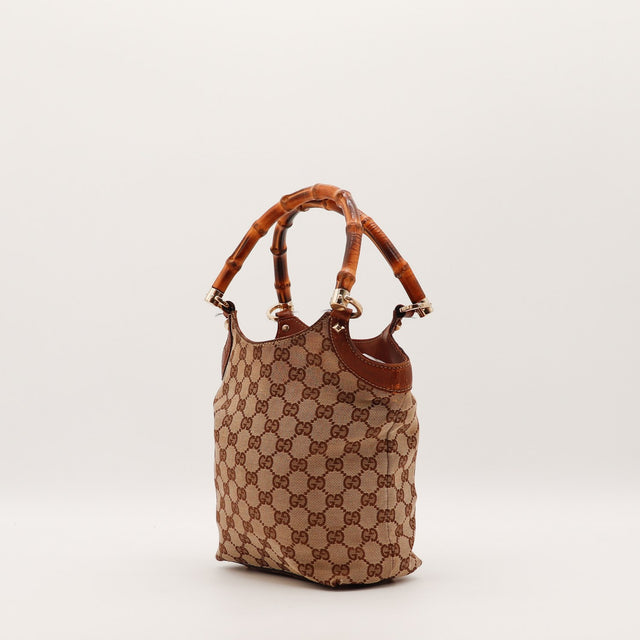 Détail du cuir Gucci Bambou marron occasion authentique — AMANA Vintage