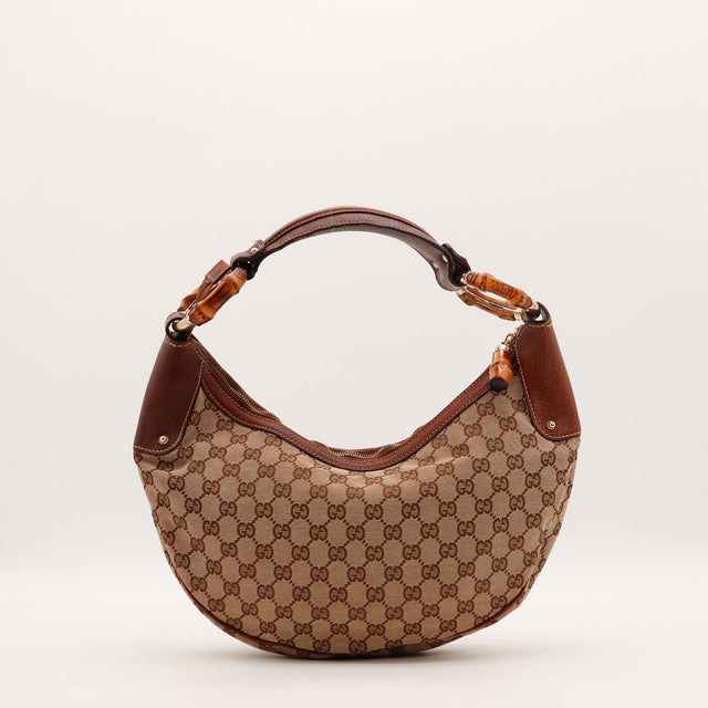 Vue de profil Gucci Hobo Bambou toile monogrammée marron occasion authentique — AMANA Vintage