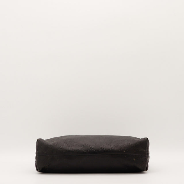 Détail des coins inférieurs Gucci Hobo Horsebit cuir Guccissima noir occasion authentique — AMANA Vintage