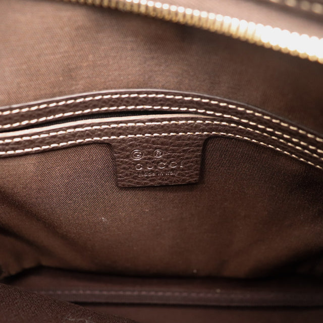 Intérieur doublure textile et estampille Gucci Made in Italy — AMANA Vintage
